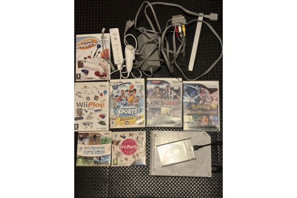 Vendo Wii + cavi + chiavetta USB 101 giochi + 7 CD di giochi. vendowiicavichiavettausb101gio-684b73ce1db41.jpg